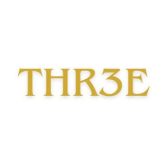 Gold 'THR3E' logo on a white background